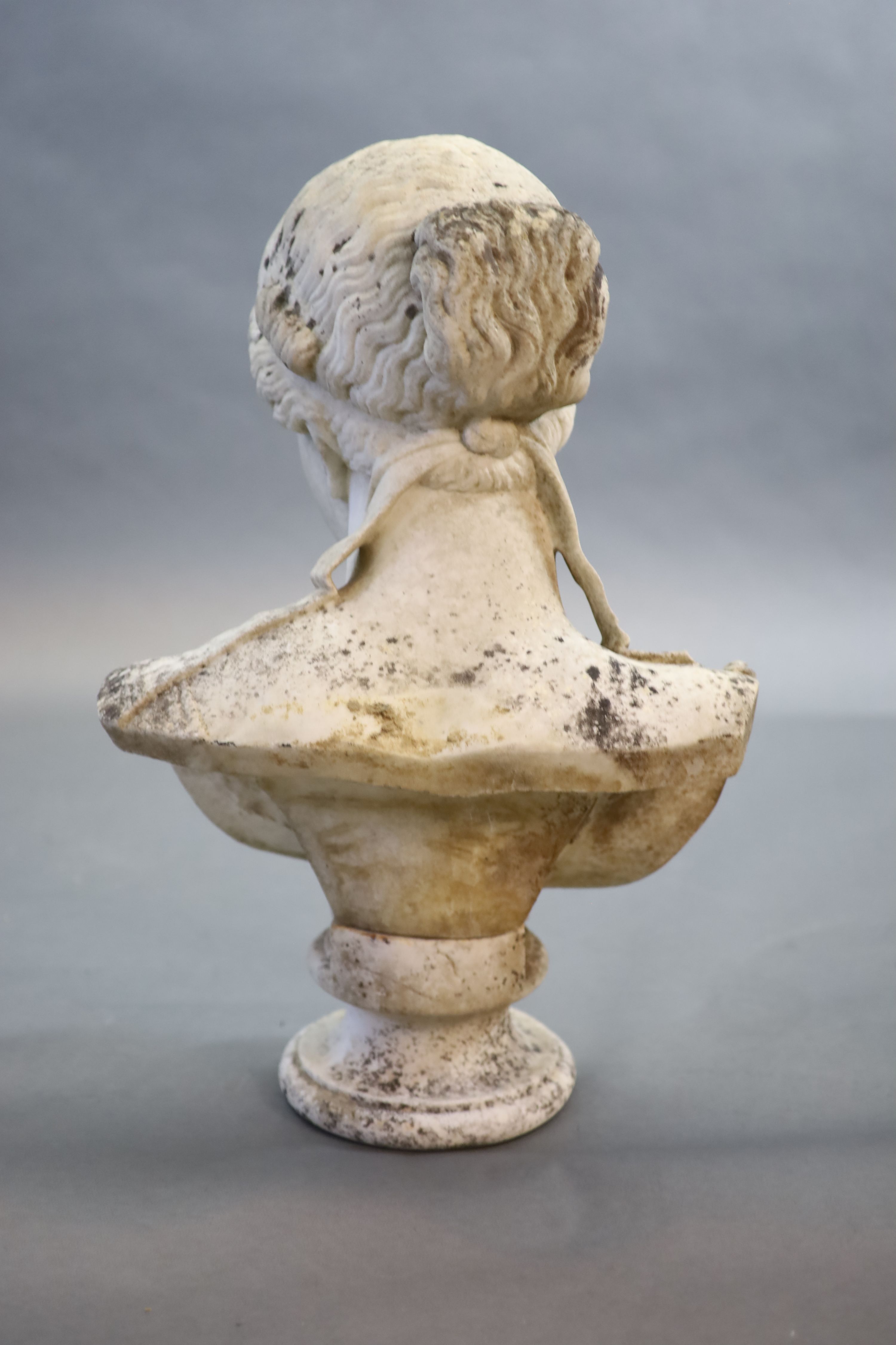 A large weathered white marble bust of a Grecian maiden, 19th centuryraised on an associated socle - Image 4 of 4