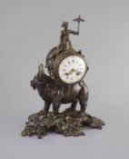 A 19th century Louis XV style bronze ‘pendule a l’elephant’,modelled with a Chinese figure seated