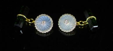 A pair of early 20th century gold, moonstone, diamond and tourmaline set cufflinks,the spiral