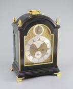 A George III ormolu mounted ebonised bracket clock by James Wild, London,the silvered chapter ring