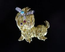A 20th century gold, sapphire, ruby, turquoise and diamond set terrier brooch,height 35mm, gross