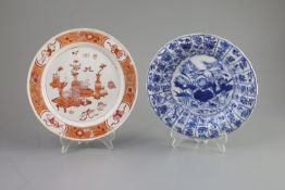 A Chinese blue and white dish and a rouge de fer plate, both Kangxi period,the dish painted with