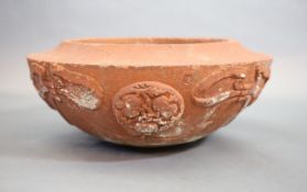 A Compton pottery ‘seasons’ terracotta planter, early 20th century,of circular form, the sides