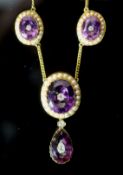 A Victorian style gold, amethyst, split pearl and old cut diamond cluster set drop necklace,with