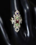 A 20th century ornate gold, garnet, peridot, sapphire and diamond chip set up-finger dress ring,