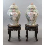 An impressive pair of Chinese famille rose ‘eight immortals’ vases and covers, late 19th century,