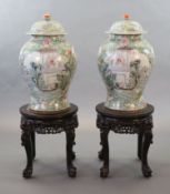 An impressive pair of Chinese famille rose ‘eight immortals’ vases and covers, late 19th century,