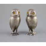 A pair of late 19th/early 20th century Dutch silver novelty pepperettes, modelled as owls,with