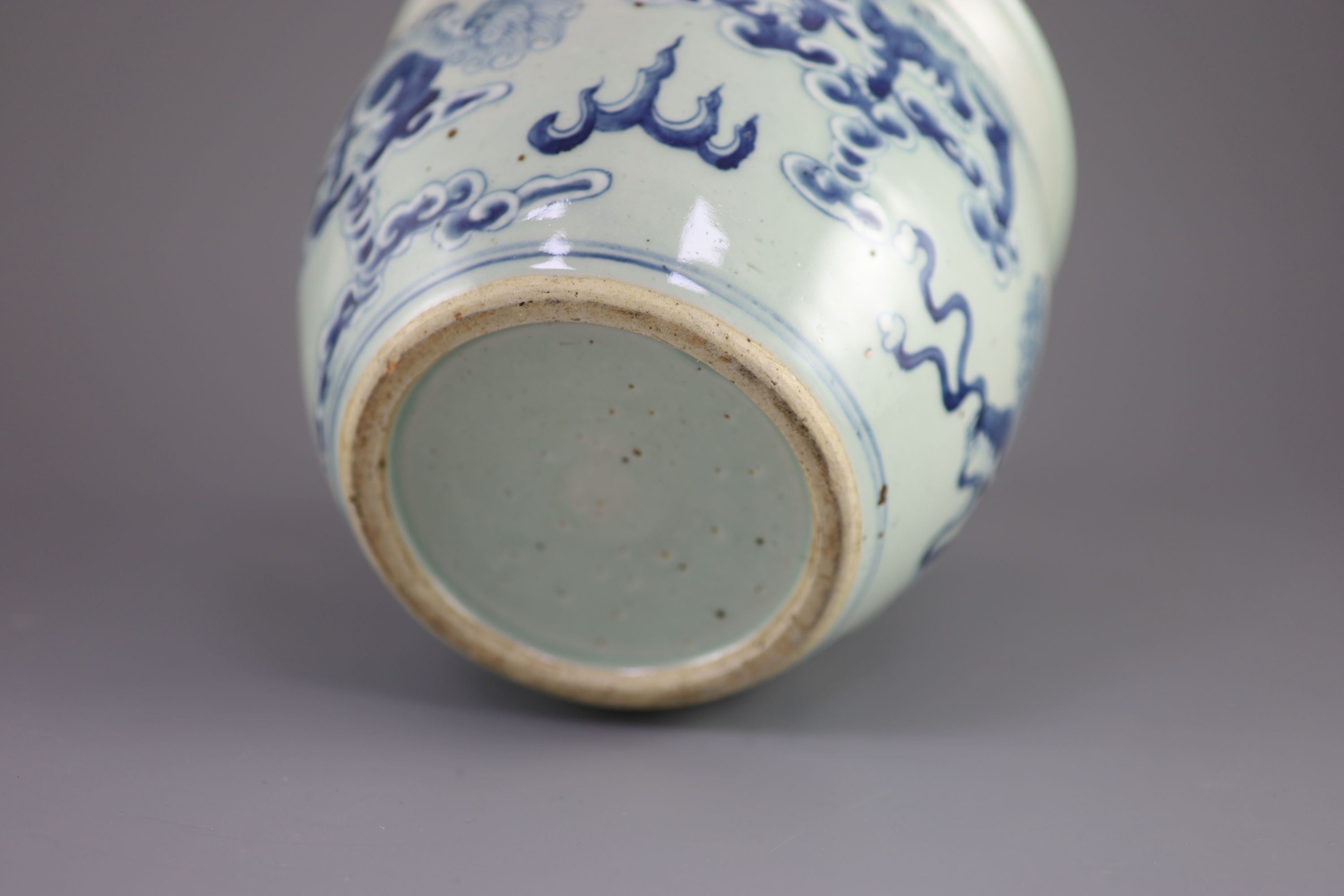 A Chinese blue and white 'lion-dog' flower pot,painted with lion-dogs on white slip, on a pale - Image 6 of 6