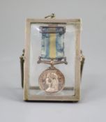 A Victoria New Zealand 1860-1864 medal,Awarded to Capt. A Cook, 40th Regiment, framed and glazed in