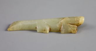 A Chinese archaic celadon jade figure of a crocodile,the stone with some slight russet inclusions