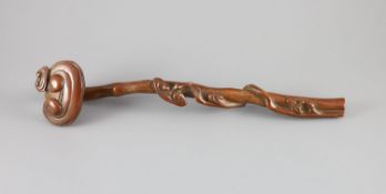A Chinese boxwood ruyi sceptre, 18th/19th century,carved as lingzhi fungus, warm caramel brown