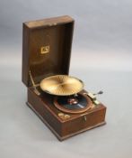 A HMV Lumiere model oak cased 460 gramophone, c1925,with original (unbroken) Lumiere pleated gilt