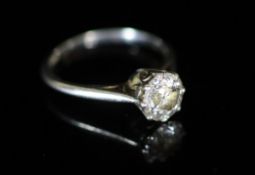 An 18ct white gold and solitaire diamond ring,the stone weighing approximately 1.35ct, size N,