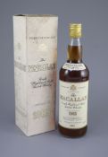 A bottle of Macallan 1965 17 Years Old Single Malt Scotch Whisky, matured in sherry wood, bottled