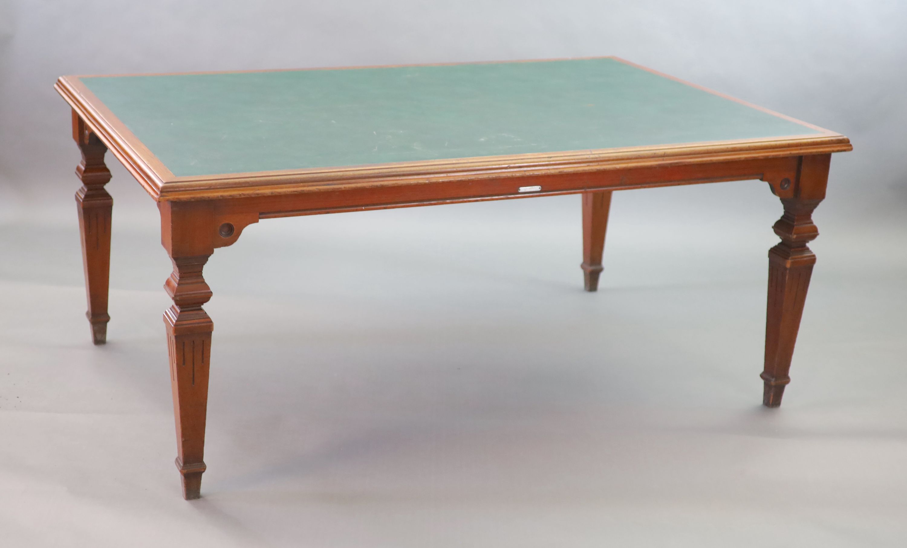 A Victorian mahogany library table, supplied by Sage & Co. Shopfitters of London,the rectangular