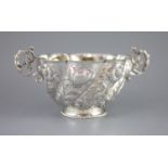 A Victorian silver two-handled footed bowl,of shaped circular fluted form, attractively embossed