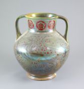A Pilkingtons Royal Lancastrian lustre two handled vase, by Gordon M. Forsyth,painted with heraldic
