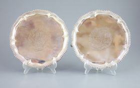 A pair of early George III silver salvers by Richard Rugg,of shaped circular form, with gadrooned