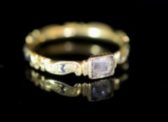 An early George II gold, black enamel and rock crystal? set mourning ring(a.f.),the shank inscribed