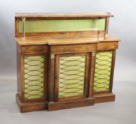 A Regency rosewood breakfront chiffonier, the raised back with three quarter gallery,glazed silk