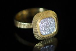 A modern 18ct gold and pave set diamond square cluster ring,with textured shank and setting, size
