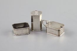 Royal Interest - a three piece silver cruet set,comprising mustard pot, salt and pepper pot,