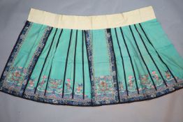 A 19th century Chinese silk kesi woven skirt,woven with multi-coloured dragons, phoenix and