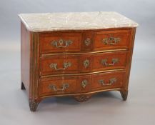 A Louis XVI parquetry serpentine commode,with variegated grey marble top, two short and two long