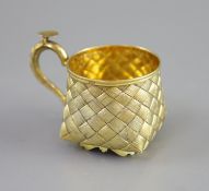 A late 19th century Russian 84 zolotnik silver gilt cup,with basket weave decoration, assay master,