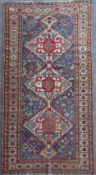 An antique Qashqai blue ground rug184 x 95cm