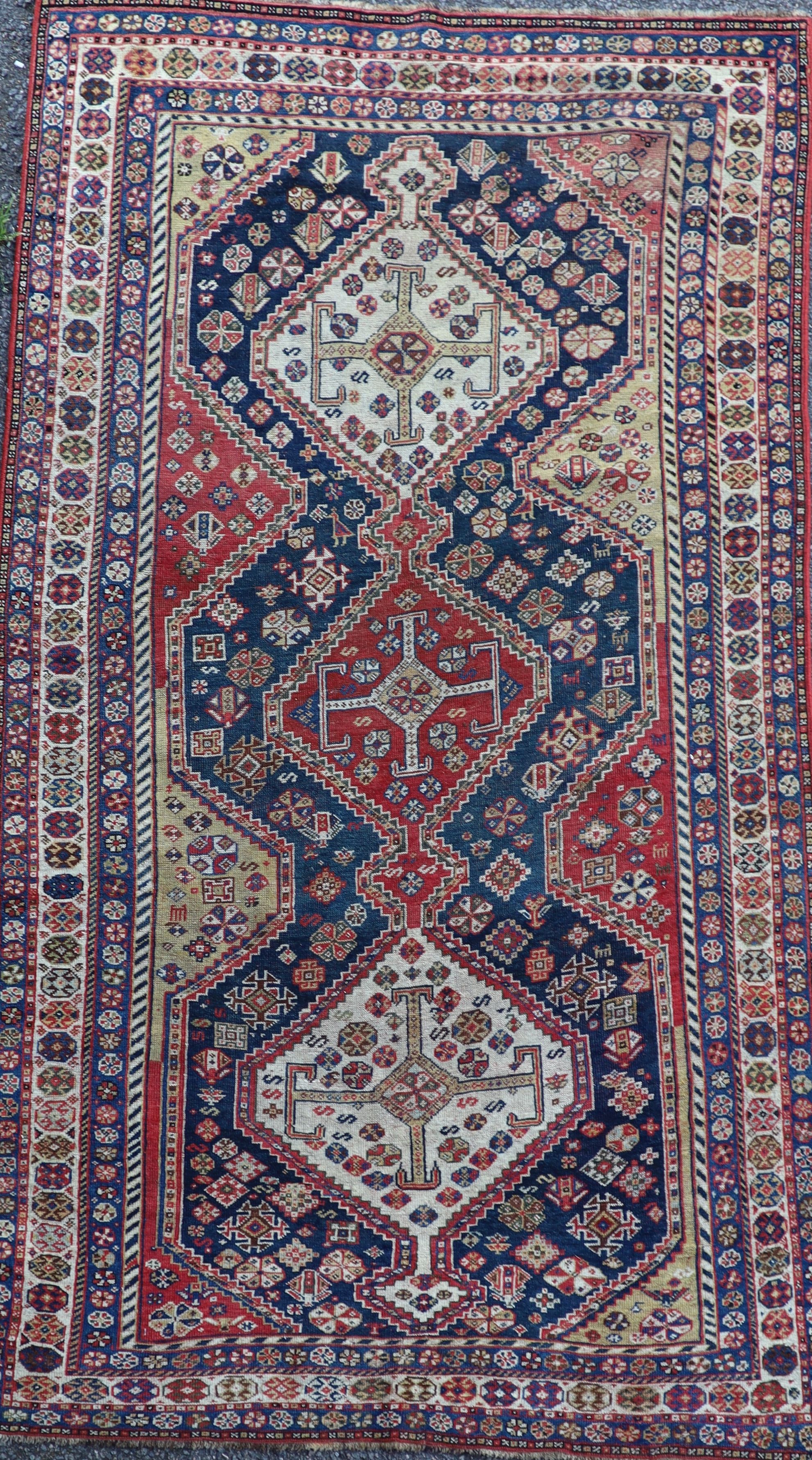 An antique Qashqai blue ground rug220 x 127cm