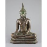 A large Thai bronze seated figure of Buddha Shakyamuni, Ayutthaya Period, 17th/18th century,seated