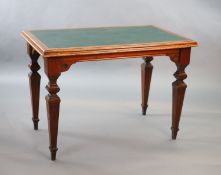 A late Victorian mahogany writing table, supplied by Sage & Co. Shopfitters of London,with green