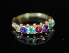 A 19th century gold and multi gem set ‘Dearest’ half hoop ring,with milled setting and carved and