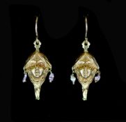 A pair of Art Nouveau gold and baroque pearl set drop earrings,modelled as the face of a lady, 33mm
