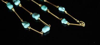 An early to mid 20th century Liberty & Co style gold baton link and turquoise pebble set necklace,