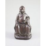 A Chinese Zitan seated figure of an official, 18th century,the figure holding a fly whisk in his
