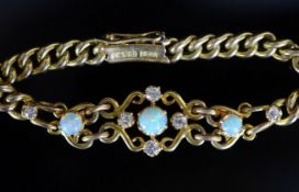An early 20th century 15ct gold white opal and diamond set curblink bracelet,15cm, gross weight 10.