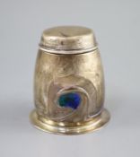 An Edwardian Art Nouveau Liberty & Co Cymric silver and enamel tobacco jar and cover,of ovoid form,