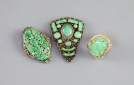Two Chinese jadeite and gilt metal clips, first half 20th century and a yellow metal jadeite ‘fish’
