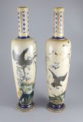 A large pair of Martin Brothers 'eagle and vulture' stoneware vases, dated 1878,each decorated in ‘