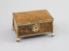 A German ormolu mounted agate casket, 19th century,with chased scrolling escutcheon, raised on