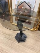 An Art Deco style occasional table with a figural metal female base, base height 60cm glass top