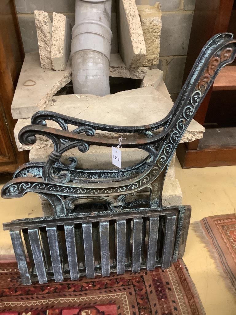 A cast iron garden seat, approx. width 68cm