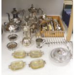 A group of assorted plated wares including a set of four gilt salts and a butter dish