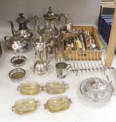 A group of assorted plated wares including a set of four gilt salts and a butter dish