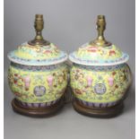 A pair of Chinese yellow ground porcelain table lamps, height 25cm excl. light fittings