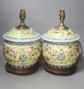A pair of Chinese yellow ground porcelain table lamps, height 25cm excl. light fittings