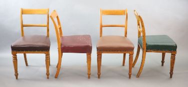 A set of eight early Victorian oak dining chairs,with curved cresting rails and spars and